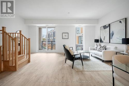 3 - 170 Clonmore Avenue, Toronto, ON - Indoor Photo Showing Living Room
