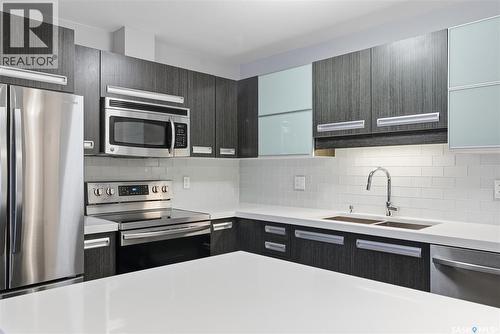 106 211 Ledingham Street, Saskatoon, SK - Indoor Photo Showing Kitchen With Stainless Steel Kitchen With Double Sink With Upgraded Kitchen