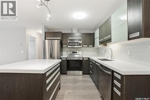 106 211 Ledingham Street, Saskatoon, SK - Indoor Photo Showing Kitchen With Stainless Steel Kitchen With Double Sink With Upgraded Kitchen