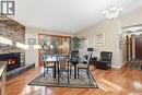 346 Sylvian Crescent, Saskatoon, SK  - Indoor Photo Showing Dining Room With Fireplace 