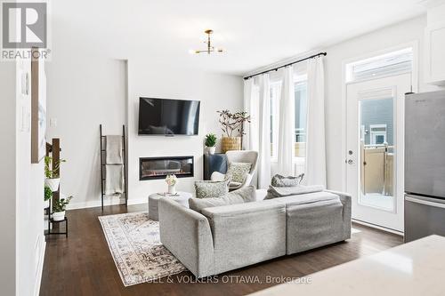 207 Argonaut Circle, Ottawa, ON - Indoor Photo Showing Living Room With Fireplace
