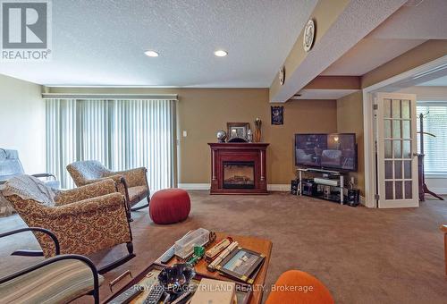 19 - 578 Mcgarrell Place, London North (North R), ON - Indoor Photo Showing Living Room With Fireplace