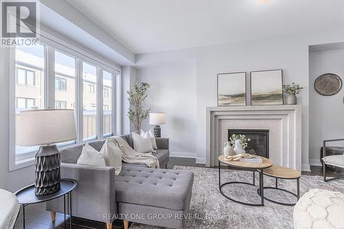 1044 Suddard Avenue, Oshawa, ON - Indoor Photo Showing Living Room With Fireplace