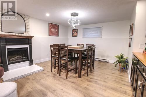20 Mercers Road, Conception Bay South, NL - Indoor Photo Showing Other Room With Fireplace