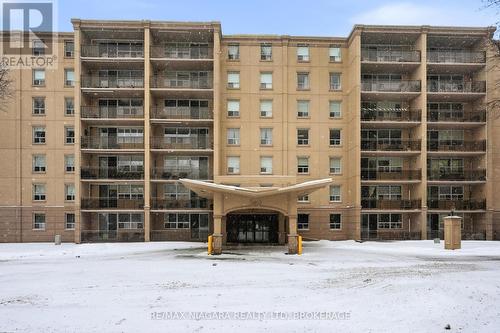 601 - 6390 Huggins Street, Niagara Falls (Stamford), ON - Outdoor With Balcony With Facade