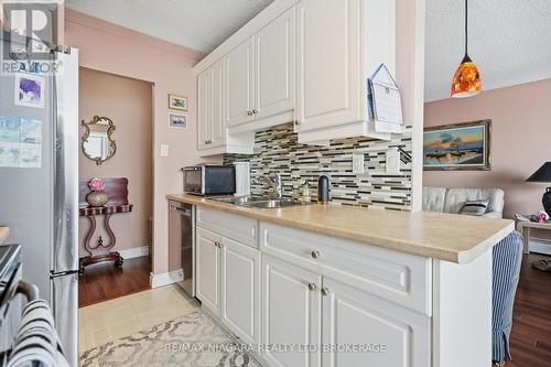 601 - 6390 Huggins Street, Niagara Falls (Stamford), ON - Indoor Photo Showing Kitchen With Double Sink
