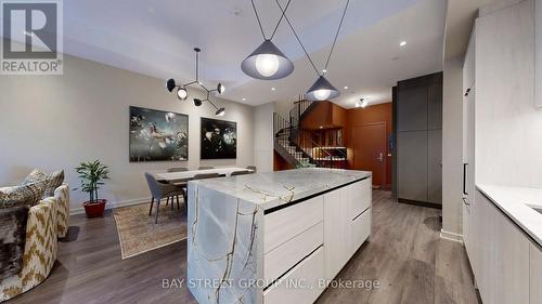 105 - 150 Logan Avenue W, Toronto, ON - Indoor Photo Showing Kitchen