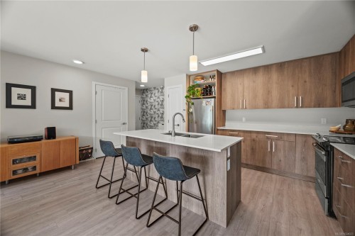 202-100 Presley Pl, View Royal, BC - Indoor Photo Showing Kitchen With Double Sink With Upgraded Kitchen