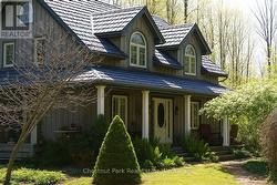 SUMMER PIC OF HOUSE PRIOR TO DECK RENOVATION - 