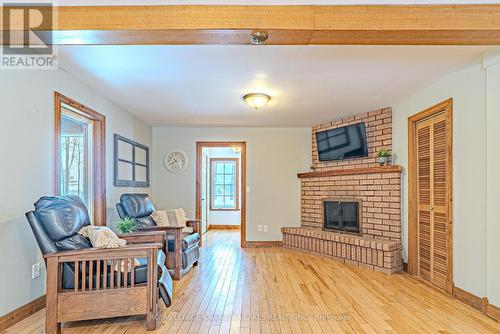61 Kenrei Road, Kawartha Lakes (Lindsay), ON - Indoor Photo Showing Living Room With Fireplace
