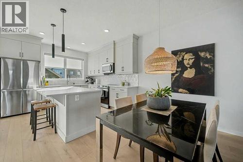 551 Wolf Creek Way Se, Calgary, AB - Indoor Photo Showing Kitchen With Upgraded Kitchen