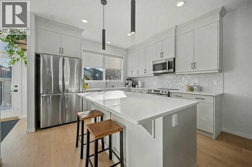 551 Wolf Creek Way Se, Calgary, AB - Indoor Photo Showing Kitchen With Upgraded Kitchen