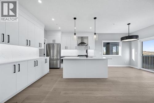 150 Prince Crescent, Rural Rocky View County, AB - Indoor Photo Showing Kitchen With Stainless Steel Kitchen With Upgraded Kitchen