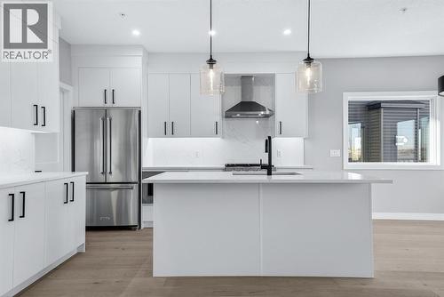 150 Prince Crescent, Rural Rocky View County, AB - Indoor Photo Showing Kitchen With Stainless Steel Kitchen With Upgraded Kitchen