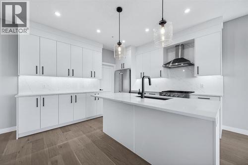 150 Prince Crescent, Rural Rocky View County, AB - Indoor Photo Showing Kitchen With Upgraded Kitchen