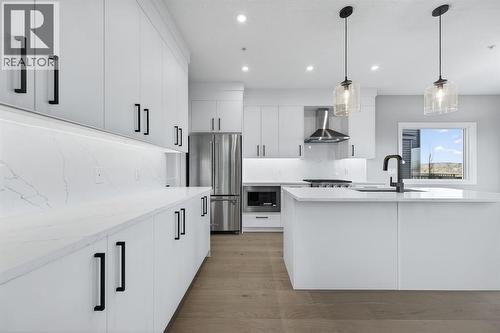 150 Prince Crescent, Rural Rocky View County, AB - Indoor Photo Showing Kitchen With Stainless Steel Kitchen With Upgraded Kitchen