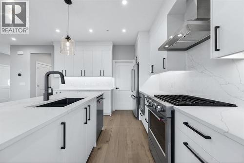 150 Prince Crescent, Rural Rocky View County, AB - Indoor Photo Showing Kitchen With Upgraded Kitchen