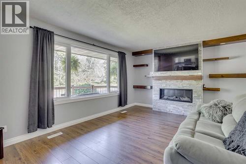 173 Hilltop Crescent, Fort Mcmurray, AB - Indoor Photo Showing Living Room With Fireplace
