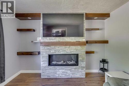 173 Hilltop Crescent, Fort Mcmurray, AB - Indoor Photo Showing Living Room With Fireplace