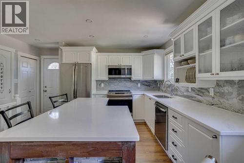 173 Hilltop Crescent, Fort Mcmurray, AB - Indoor Photo Showing Kitchen With Stainless Steel Kitchen With Double Sink With Upgraded Kitchen