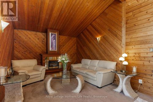 847 Corbeil Road, East Ferris, ON - Indoor Photo Showing Living Room With Fireplace
