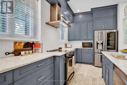 452 Hunter Street W, Peterborough (Town Ward 3), ON - Indoor Photo Showing Kitchen With Double Sink With Upgraded Kitchen