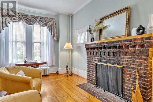 452 Hunter Street W, Peterborough (Town Ward 3), ON - Indoor Photo Showing Living Room With Fireplace