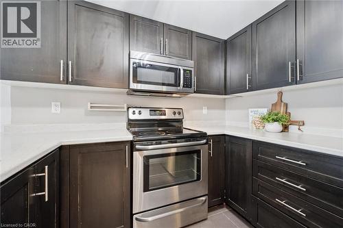 103 Westminster Crescent Unit# 212, Fergus, ON - Indoor Photo Showing Kitchen With Stainless Steel Kitchen With Upgraded Kitchen