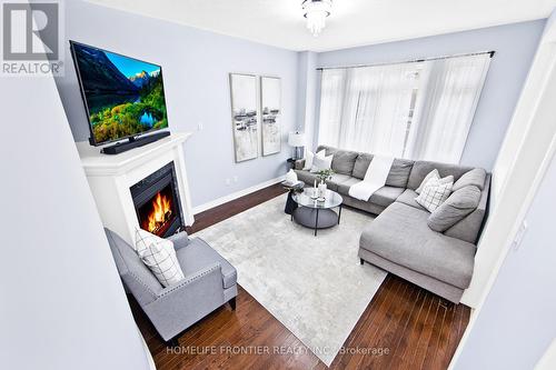 64 - 280 Paradelle Drive, Richmond Hill, ON - Indoor Photo Showing Living Room With Fireplace