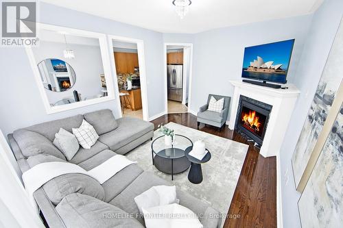 64 - 280 Paradelle Drive, Richmond Hill, ON - Indoor Photo Showing Living Room With Fireplace