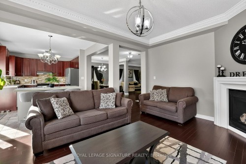 23 Openbay Gardens, Brampton, ON - Indoor Photo Showing Living Room With Fireplace