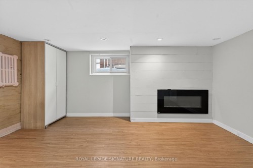 3 Wanstead Avenue, Toronto, ON - Indoor Photo Showing Other Room With Fireplace