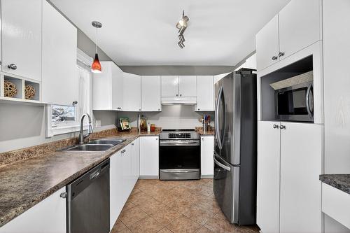 Kitchen - 13715 Rue Du Noroît, Mirabel, QC - Indoor Photo Showing Kitchen With Double Sink