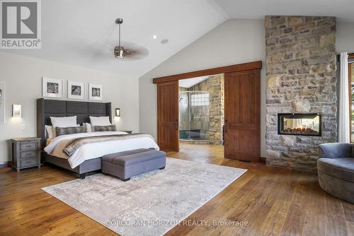 1546 Maryhill Road, Woolwich, ON - Indoor Photo Showing Bedroom With Fireplace