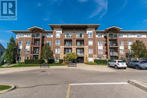 403 - 67 Kingsbury Square, Guelph, ON - Outdoor With Balcony With Facade