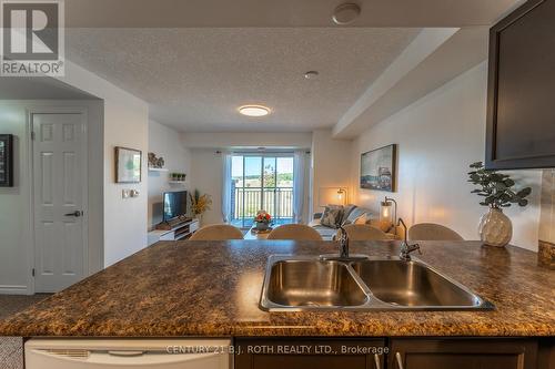 403 - 67 Kingsbury Square, Guelph, ON - Indoor Photo Showing Kitchen With Double Sink