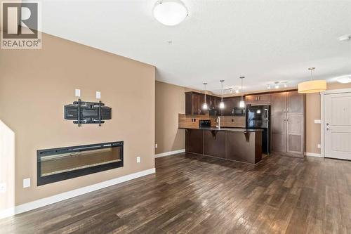 2209, 450 Sage Valley Drive Nw, Calgary, AB - Indoor With Fireplace