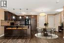 2209, 450 Sage Valley Drive Nw, Calgary, AB  - Indoor Photo Showing Kitchen With Upgraded Kitchen 