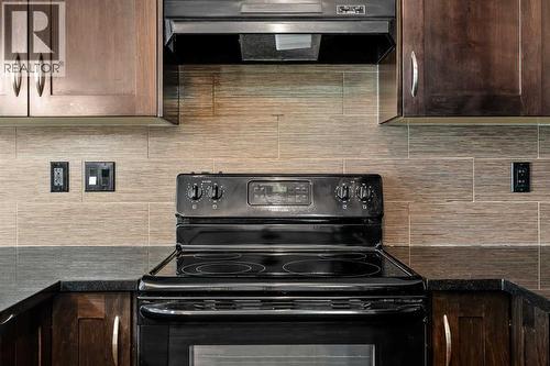 2209, 450 Sage Valley Drive Nw, Calgary, AB - Indoor Photo Showing Kitchen