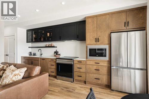 3211, 1802 Mahogany Boulevard Se, Calgary, AB - Indoor Photo Showing Kitchen With Stainless Steel Kitchen
