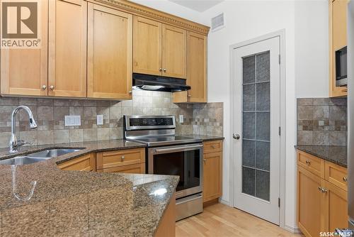112 928 Heritage View, Saskatoon, SK - Indoor Photo Showing Kitchen With Double Sink