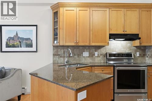 112 928 Heritage View, Saskatoon, SK - Indoor Photo Showing Kitchen With Double Sink
