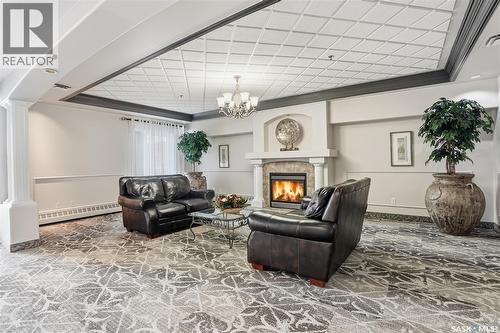 112 928 Heritage View, Saskatoon, SK - Indoor With Fireplace