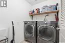 112 928 Heritage View, Saskatoon, SK  - Indoor Photo Showing Laundry Room 