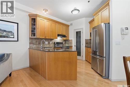 112 928 Heritage View, Saskatoon, SK - Indoor Photo Showing Kitchen With Stainless Steel Kitchen