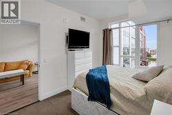 Carpeted bedroom featuring baseboards - 