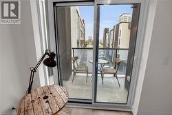 Balcony featuring a view of city - 