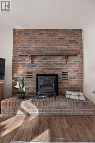 8 East Williams Street, North Middlesex (Nairn), ON - Indoor Photo Showing Living Room With Fireplace