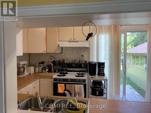 39 Lake Street, South Algonquin, ON - Indoor Photo Showing Kitchen With Double Sink