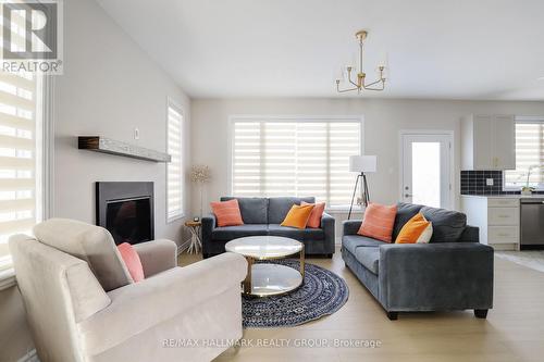 258 Sapling Grove, Ottawa, ON - Indoor Photo Showing Living Room With Fireplace